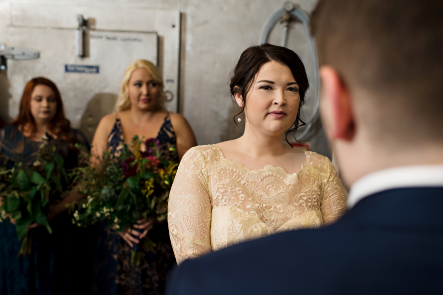 A bride crying during the wedding ceremony.